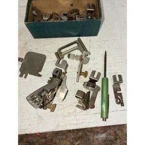 vtg sewing machine parts feet bobbins etc Greist
